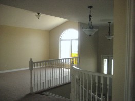 unique curved stairs in our raised ranches